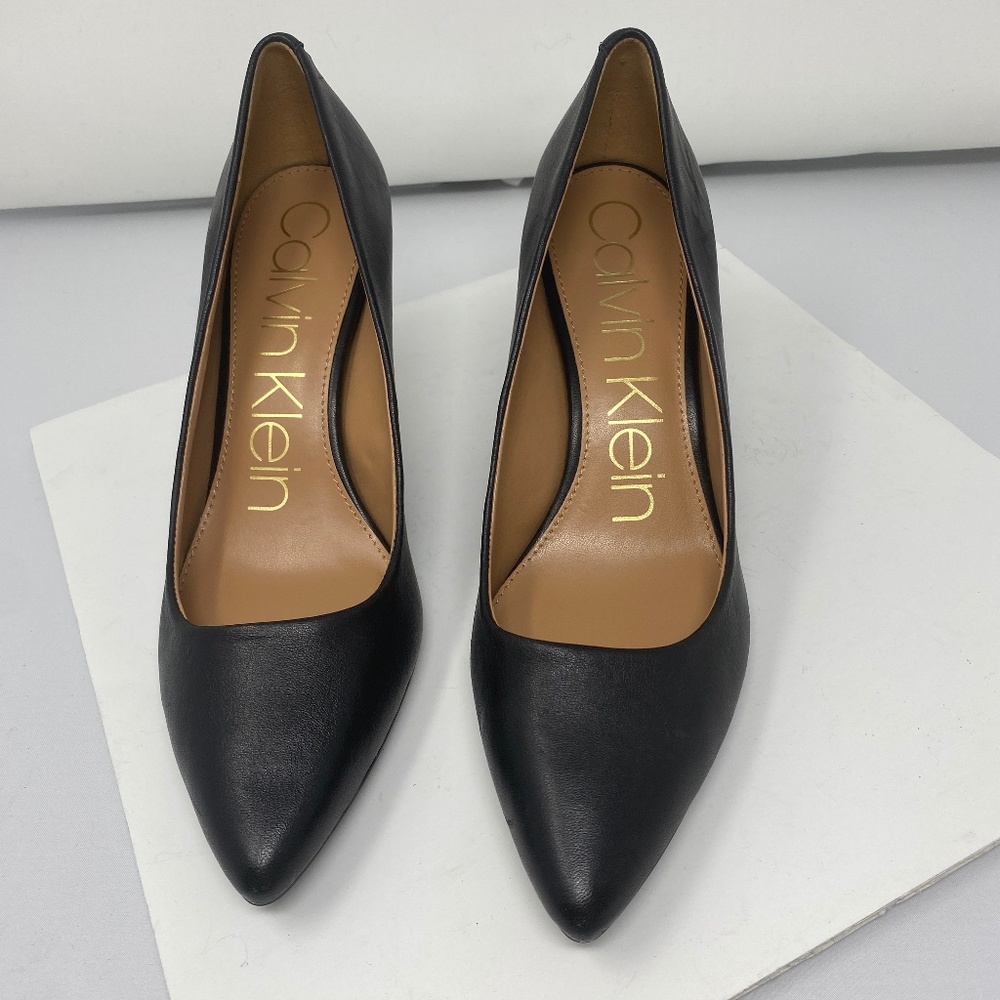 Calvin Klein Black Stiletto Pumps With Golden Tags
